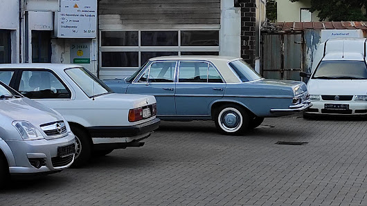 Autodienst am Dreiecksplatz, Ralph Jensen
