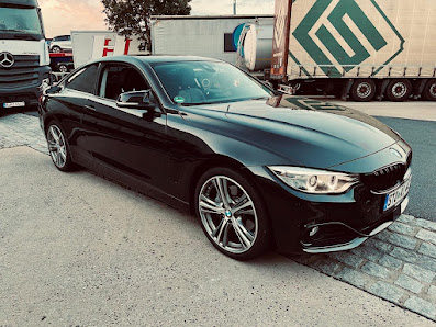 Autocenter alb